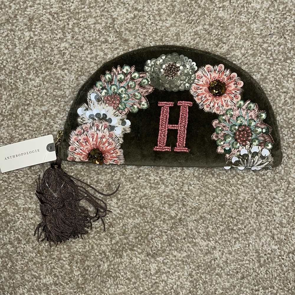 anthropologie beaded “H” clutch
